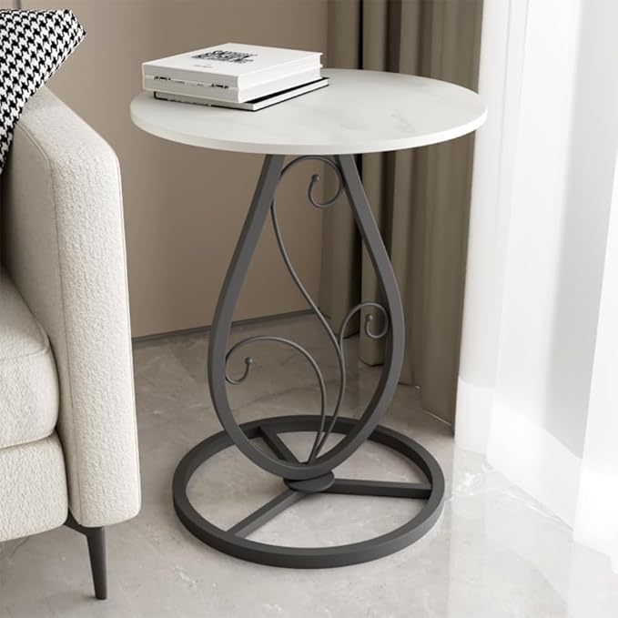 Elegance Side Table – Round White Top with Artistic Black Curved Metal Base. Perfect for Living Rooms, Bedrooms, or Lounges.