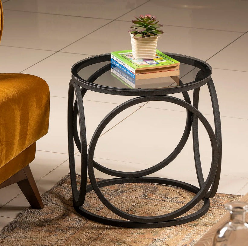 Modern metal frame bedside table with unique design, versatile sofa side table for bedroom storage and decor.
