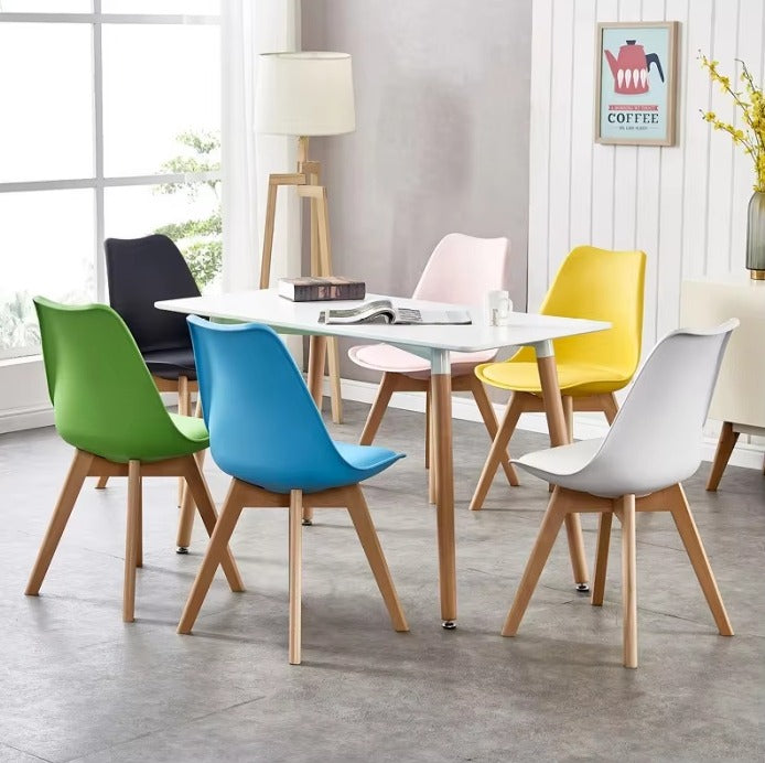 Classic Modern Tulip Chair smooth seat design and strong wooden legs make it a reliable and stylish seating