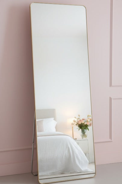 Unbreakable full-length wall mirror by Metal Furniture, modern leaning and wall-mounted design for contemporary interiors.