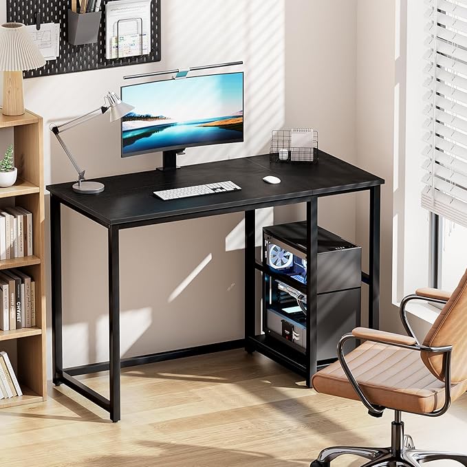 Metal Furniture office desk with walnut-finish tabletop, black metal frame, and built-in lower shelf for organized workspace.