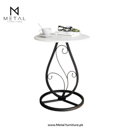 Elegance Side Table – Round White Top with Artistic Black Curved Metal Base. Perfect for Living Rooms, Bedrooms, or Lounges.