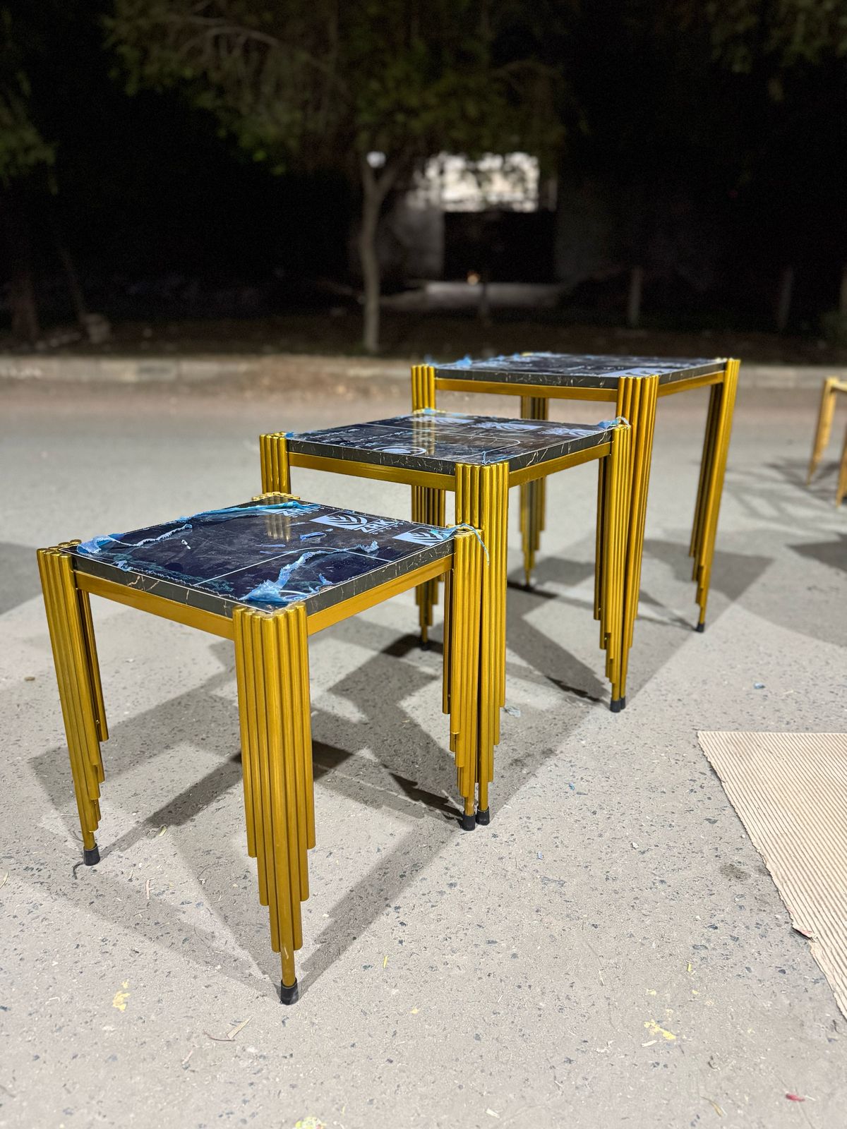 Elegant nesting Tables With Glass And Steel Frames stainless steel furniture & dining table by Khreedoo Furniture Home decor