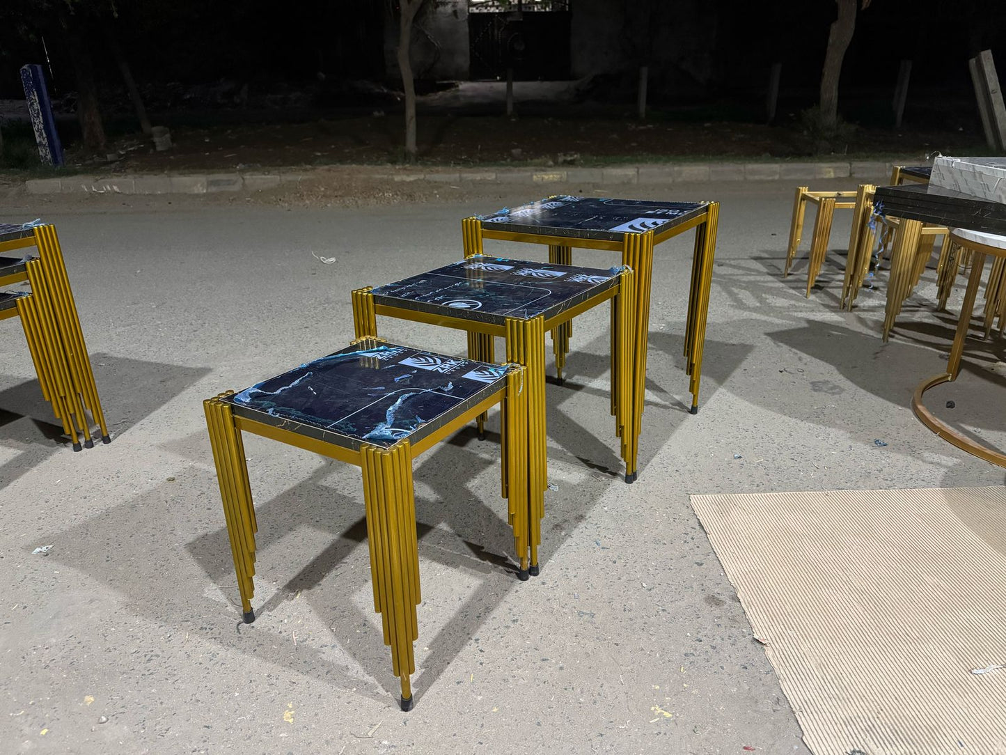 Elegant nesting Tables With Glass And Steel Frames stainless steel furniture & dining table by Khreedoo Furniture Home decor