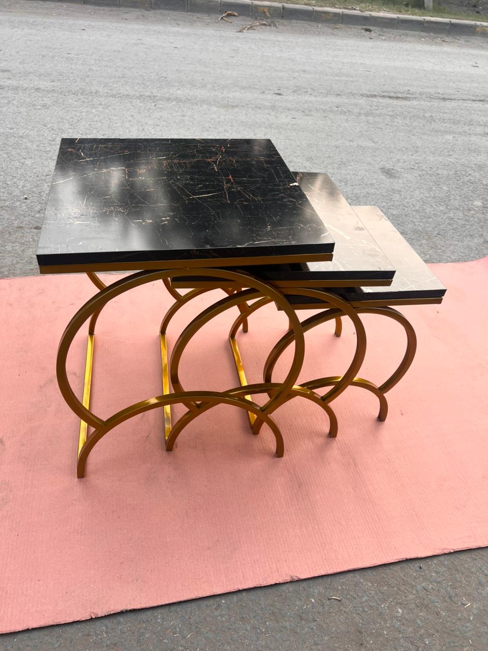 Modern Luxury Nesting Table Set Featuring Golden Metal Base and Smooth Marble Texture Tops