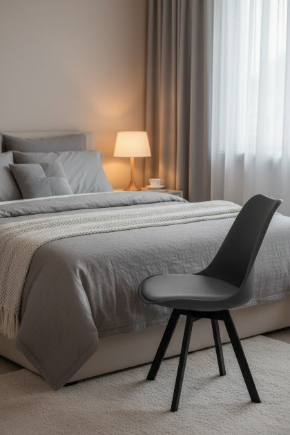 Modern Tulip Chair by Metal Furniture with smooth seat and sturdy metal legs, offering stylish and reliable seating.