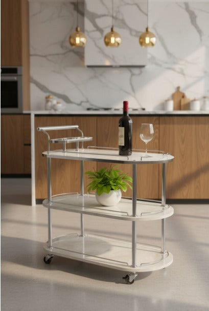 Modern kitchen island with a bar cart, wine bottle, and glasses.