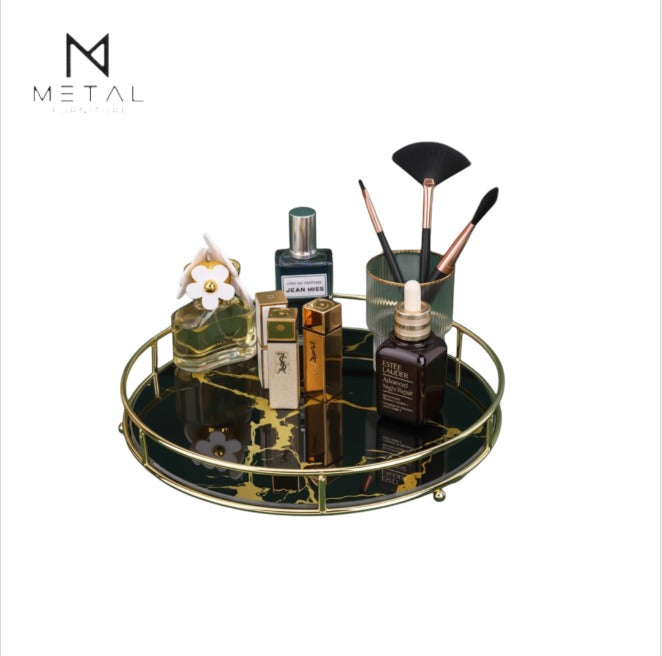 Gold metal round makeup organizer tray for bathroom and bedroom decor, stylish vanity tray for jewelry and cosmetics.