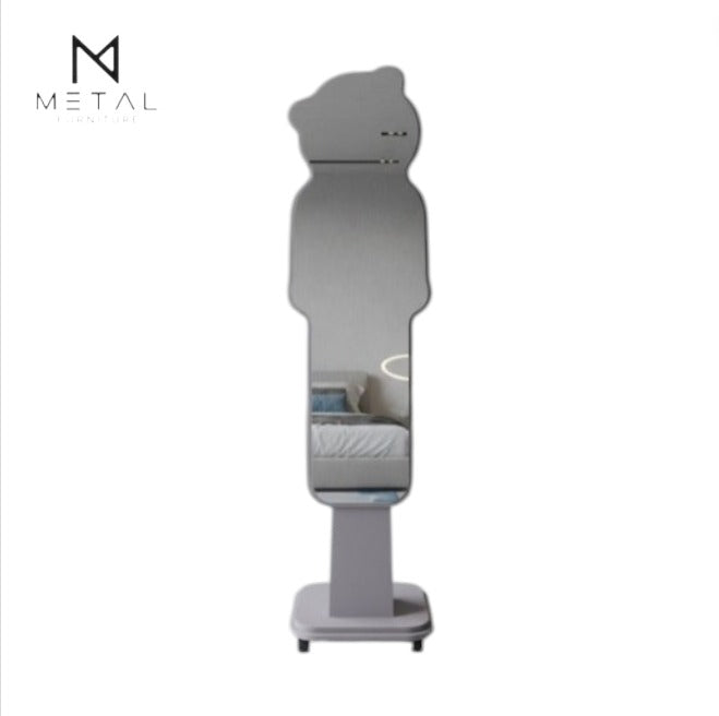 Curved silhouette mobile dressing mirror with shatterproof unbreakable glass by Metal Furniture, showing its sleek, portable design.