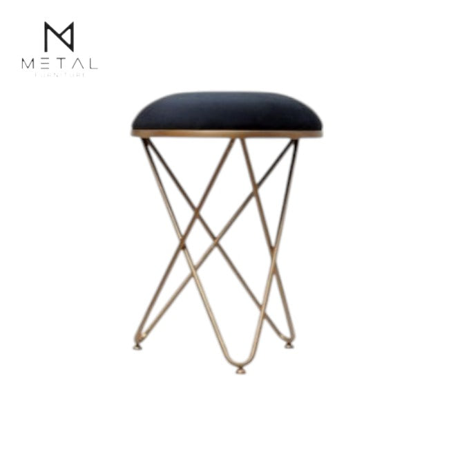 Velvet top cross-leg ottoman stool by Metal Furniture, ideal for living room decor with a modern design and sturdy wooden legs.