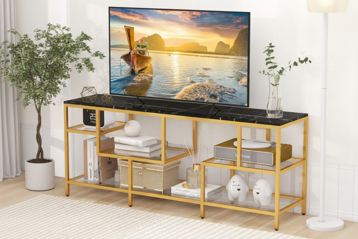Gold TV stand with marble top displaying a scenic television screen, flanked by decorative items.